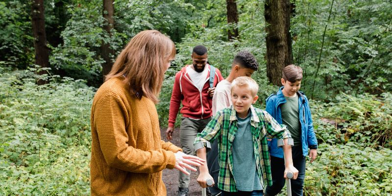Young learners studying the environment in forest school