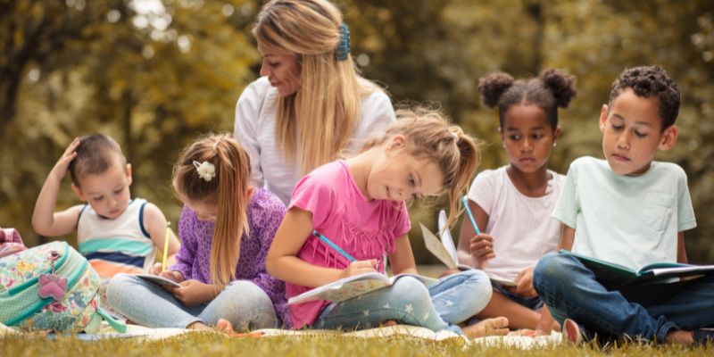 Forest School Practitioner leading a class